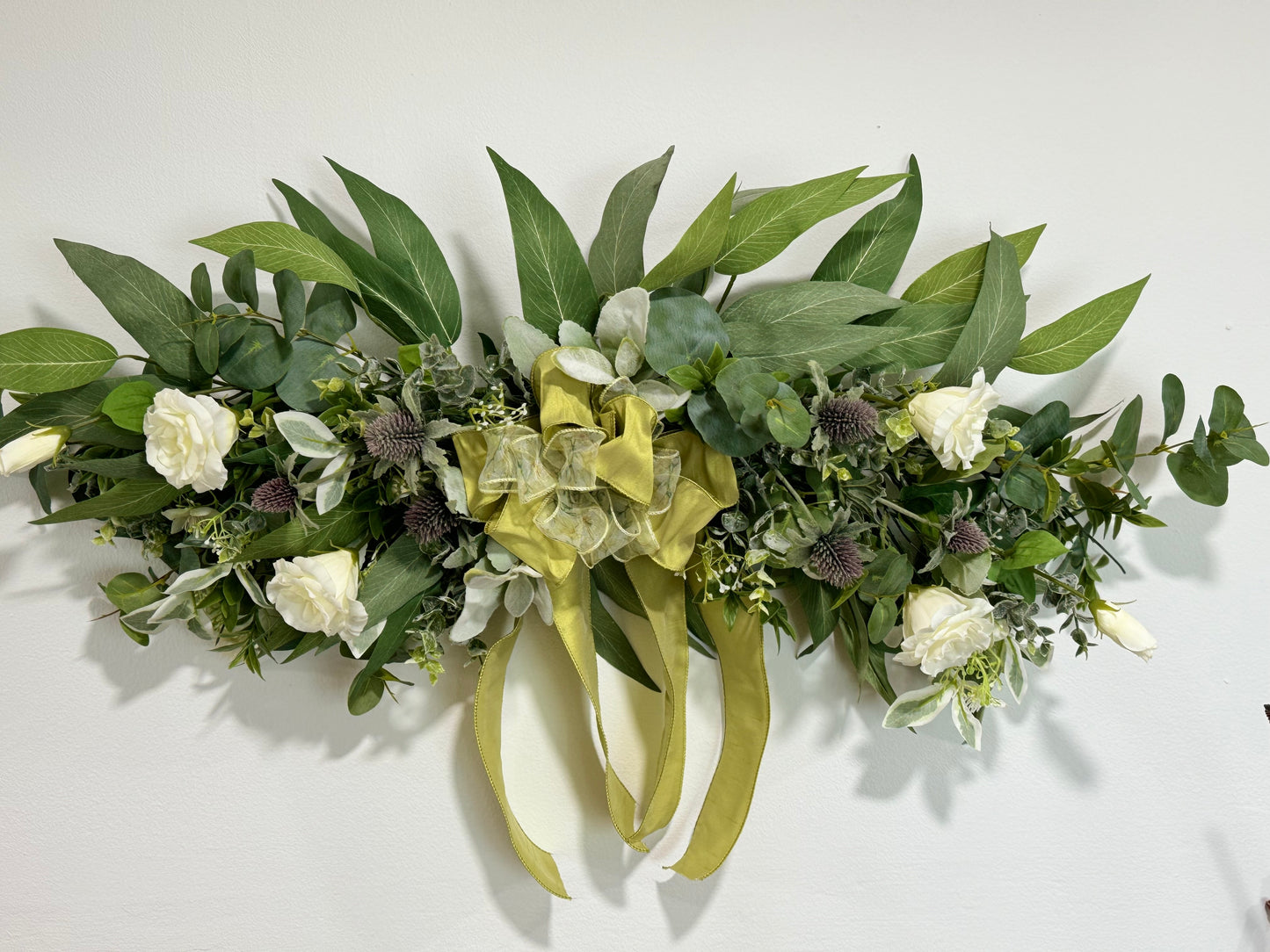 DECORATED MIXED FOLIAGE CRESCENT SWAG