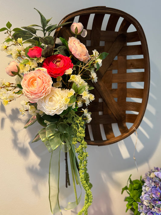 Bouquet on dark brown tobacco basket