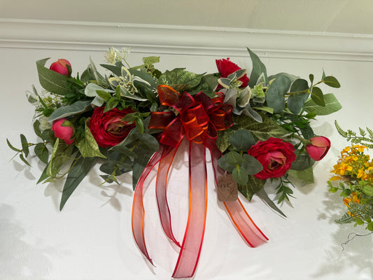 Decorated swag - Ranunculus and mixed greens